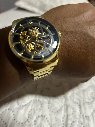Relógio thecnos dourado 