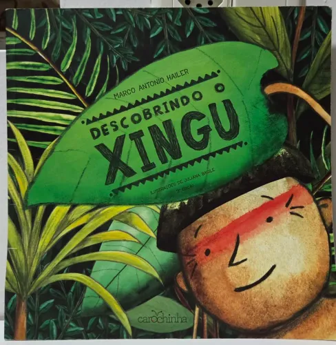 Livro 'Descobrindo o Xingu' em excelente estado de conservação