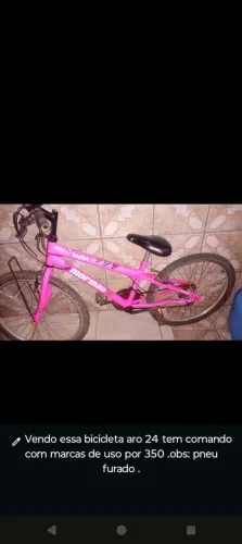 Vendo bicicleta aro 24 com comando ,400 a vista . Observação:precisa trocar cela