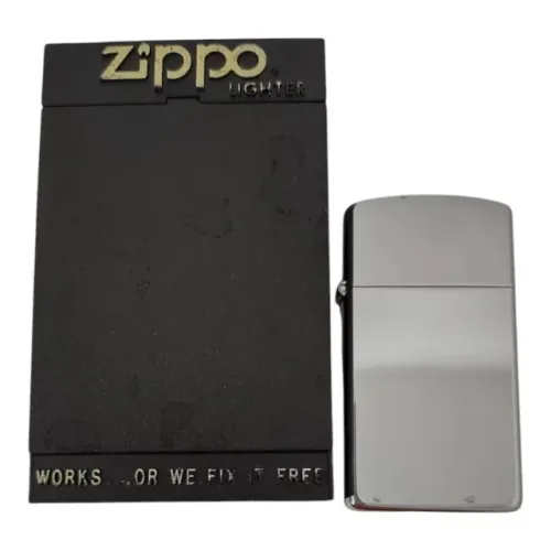 Isqueiro Zippo Slim 1610 Metal Polido Original Com Pedra
