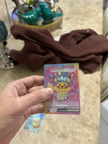 Pikachu 277/217,Clefairy 280/217 e 2 Psyduck 226/217