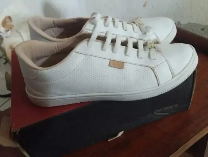 Vendo tenis feminino penélope branco novo na caixa meu zap *12 faço super frete