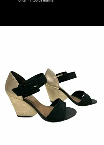 Sandália marca Ramarin/nova/ em couro no dourado com preto.número 37.