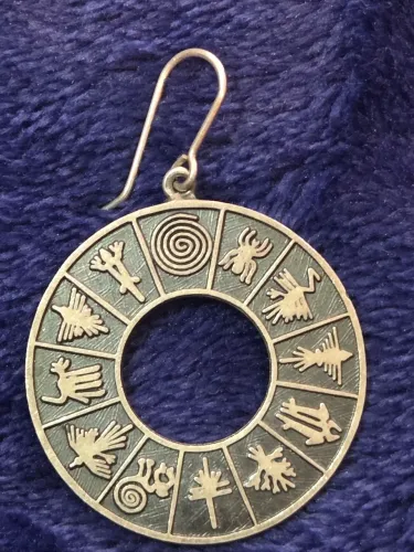 Brinco circular das Linhas de Nazca em prata peruana