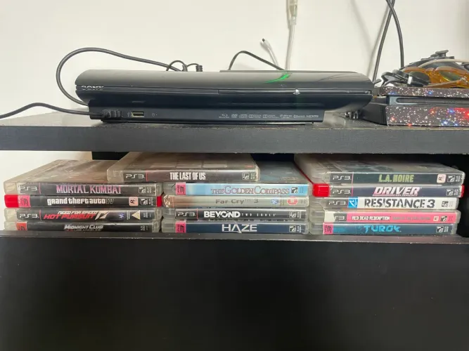 PS3 100% original com 10 jogos 