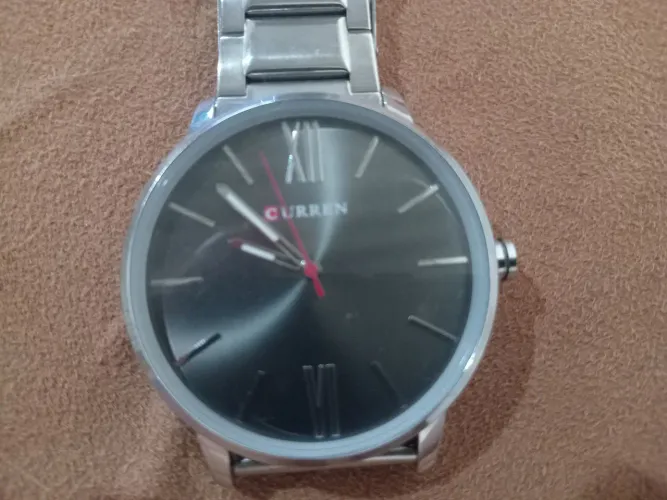 Relógio curren original prata seminovo. Aceito trocas e aceito oferta  .