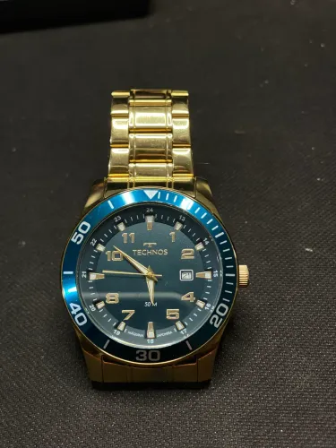 Relogio technos dourado