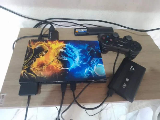 Vendo PS2 filé semi novo com HD com mais de 20 jogos e o HDMI