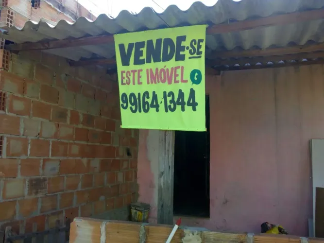 Lote com casa 