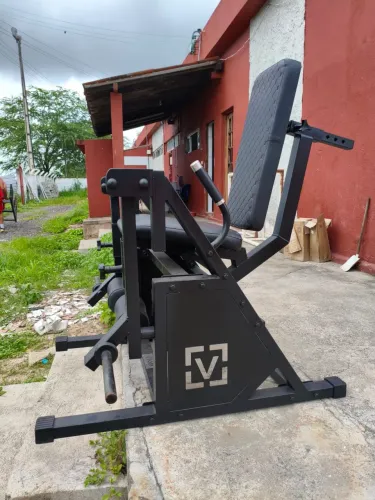 Academia: cadeira extensora 