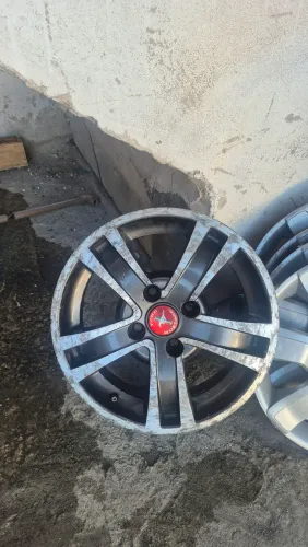 Vendo um rodas de liga leve mais um jogo de carlotas aro 14 