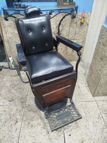 Cadeira de barbeiro ou cabeleireira