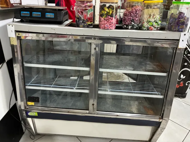 Freezer repositor vestical