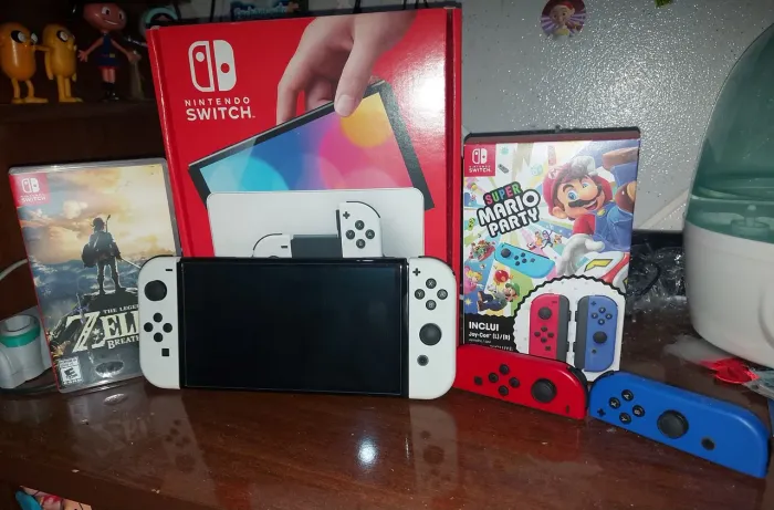 Nintendo Switch OLED Completo + 4 Joy-Cons (2 pares) + Zelda BotW