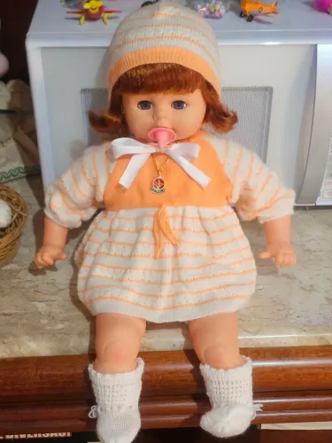 Boneco Bochechinha com caixa (mecanismo precisa de reparo)