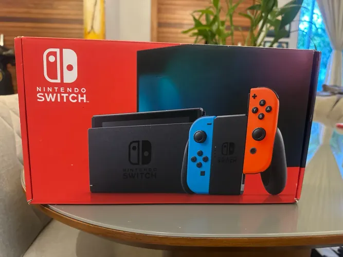 Nintendo switch 64gb em perfeito estado + cartucho de pokemon sword 80rs