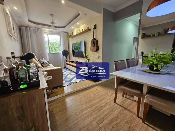Apartamento com 2 dormitórios à venda, 56 m² por R$ 300.000,00 - Jardim Bom Clima - Guarul