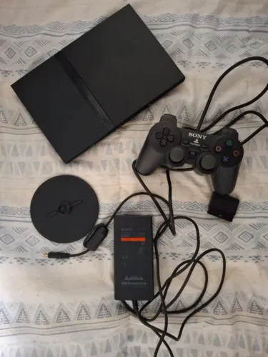 ps2 slim completo com base vertical.