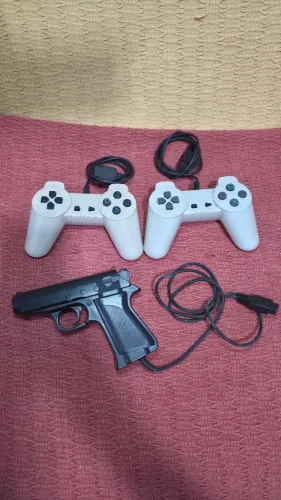 controles e pistola polystation