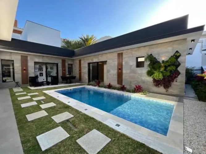 Casa de alto padrão com 4 suítes, 400 m² e valor de R$ 4.940.000
