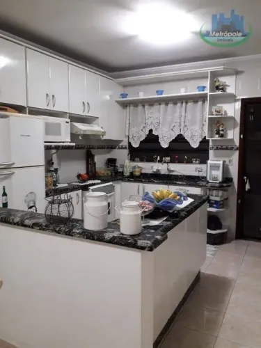 Sobrado com 4 dormitórios à venda, 135 m² por R$ 680.000 - Ponte Grande - Guarulhos/SP