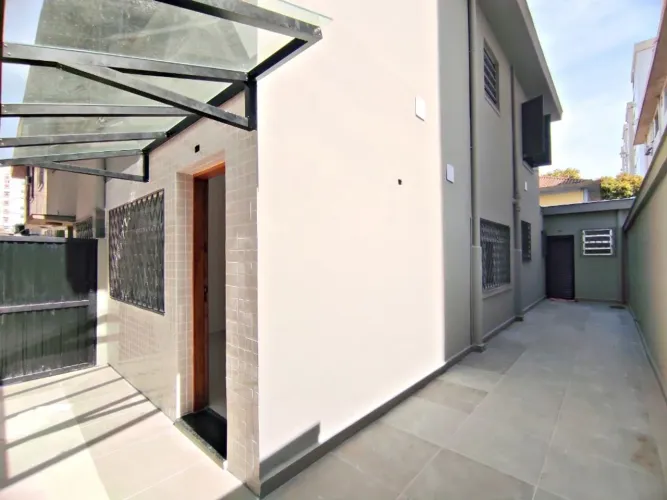 Village com 2 dormitórios para alugar, 89 m² por R$ 3.500,00/mês - Embaré - Santos/SP
