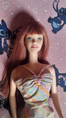 Boneca barbie ruiva pretty flowers anos 2000