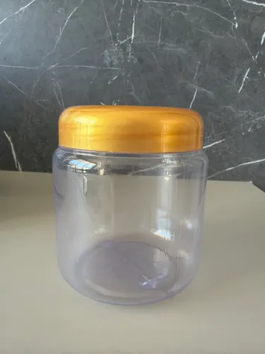 Pote transparente plástico com tampa dourada