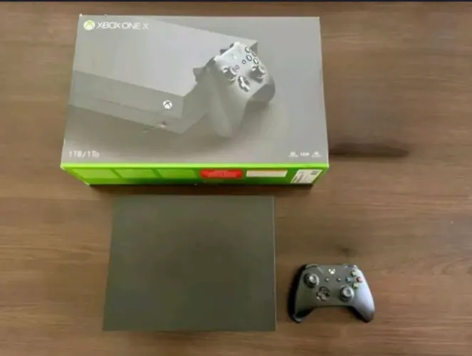 Xbox One X 1TB, na caixa, com 1 controle original e cabos.<br>