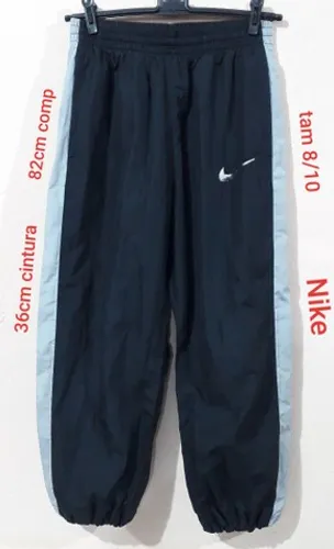 Calça Nike original de poliéster forrada tam 10 anos. Ver medidas na primeira foto