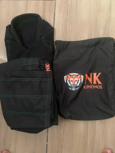 VENDO OU TROCO KIMONO A2 NUNCA USADO