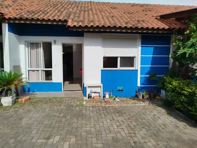 Casa térrea com 2 (dois) dormitórios em condomínio fechado na Estância Velha - Canoas - RS