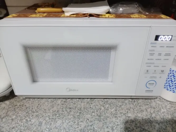 Vendo microondas novo