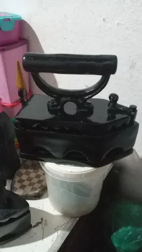 Ferro antigo carvão