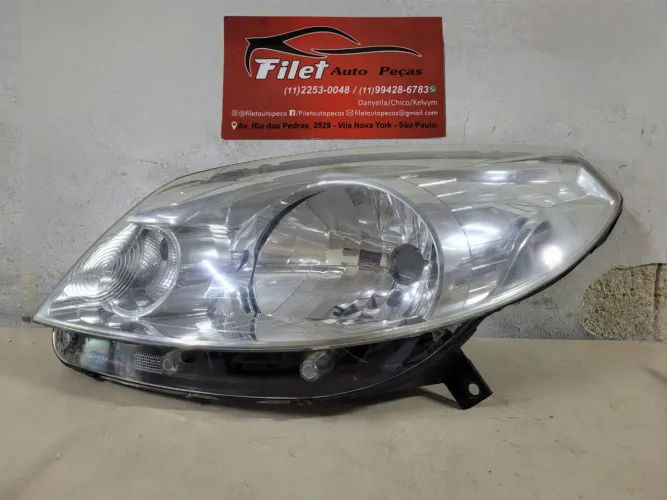 Farol esquerdo Sandero 2011 a 2014 Cromado 