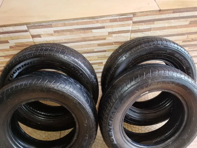 Vendo esses 4 pneus meia vida ARO 13