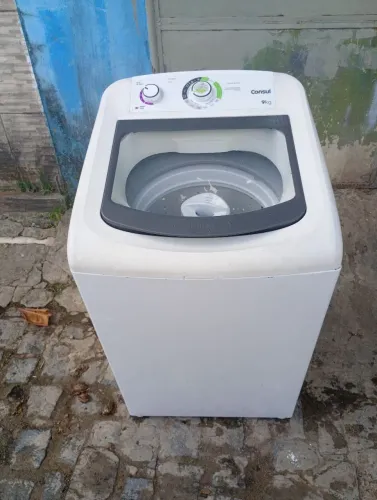 Máquina de lavar roupa funcionando perfeitamente 