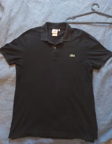 camisa polo lacoste original na cor preta, em excelente estado ver medidas no anuncio