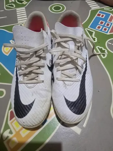 Chuteira Nike mercurial campo