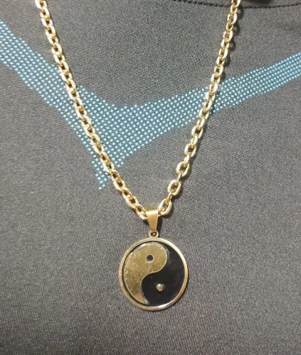 Cordão de aço cor dourado novo