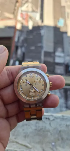 Relógio swatch dourado feminino vendo olx pay mais entrega para todo Brasil faço envio