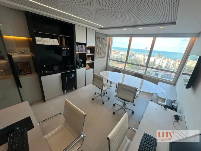 Sala comercial com 30 m² em andar alto com vista para o mar