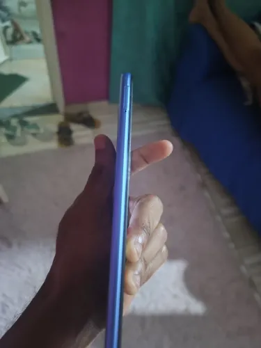 Celular 10c novo