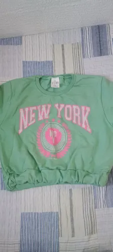 Jaqueta moletom verde com detalhes brilho capuz