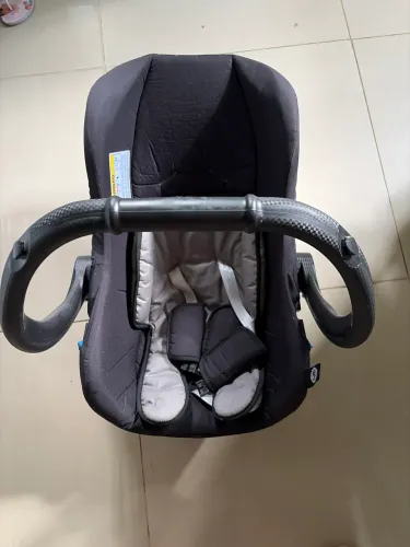 Bebê conforto tutti baby com capa