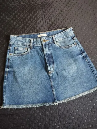 Saia jeans comprimento médio azul jeans