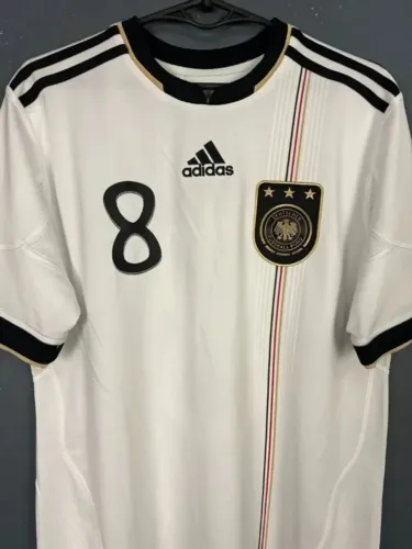 Camisa Alemanha Eliminatórias da Eurocopa 2010/2011 Uniforme 1 Mesut Özil #8
