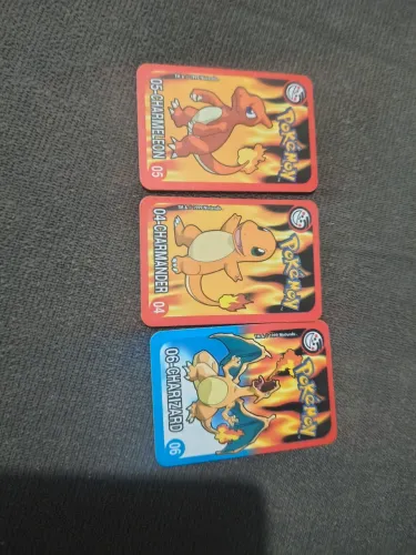 Pokémon Charizard e evoluções super cartas Elma Chips