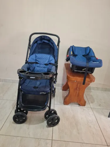 Conjunto: Carrinho Cosco Reverse acompanhado de Bebê Conforto.