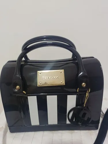 Bolsa semi nova Petit Jolie 